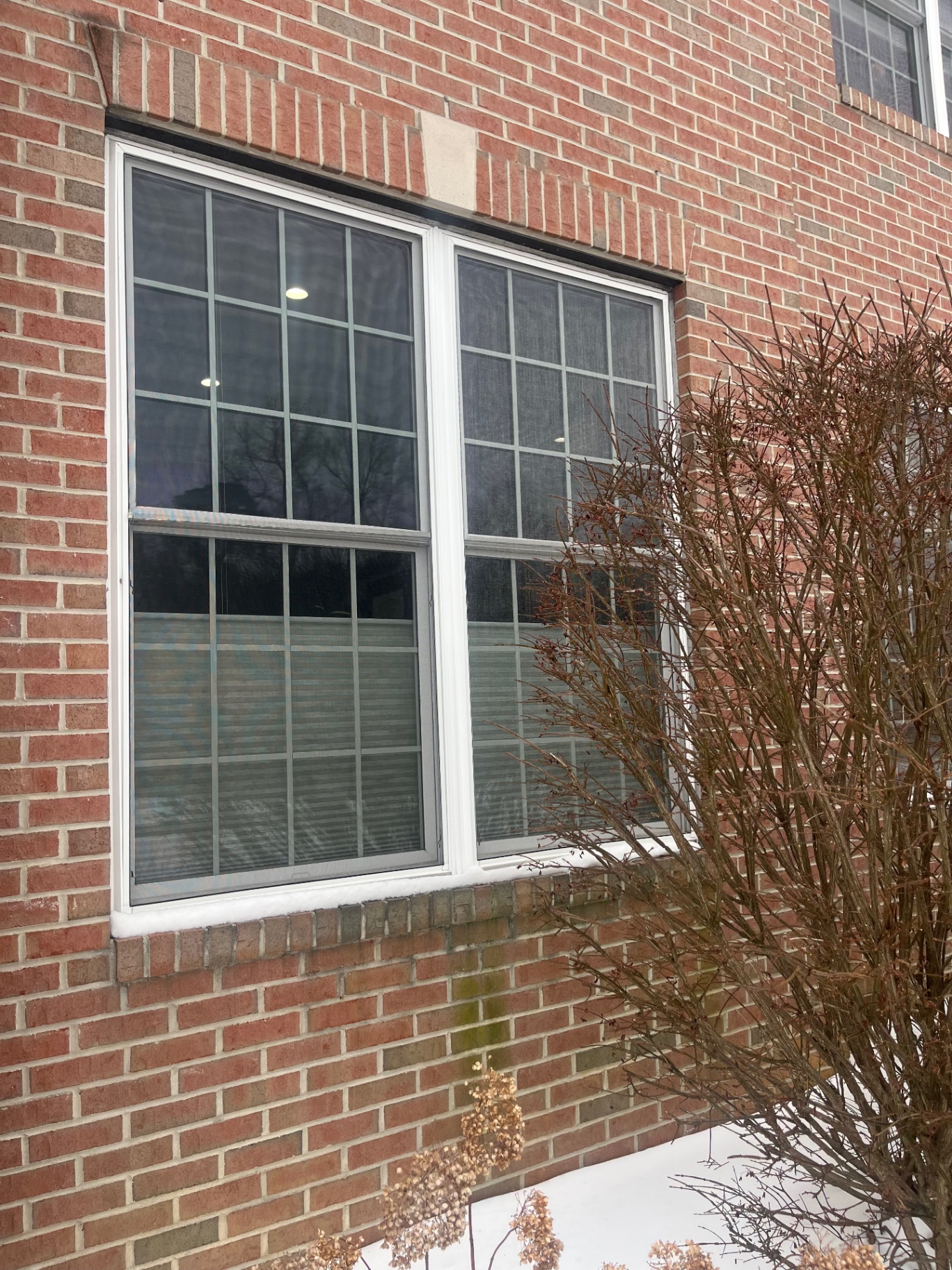 Brick wall casement window — before