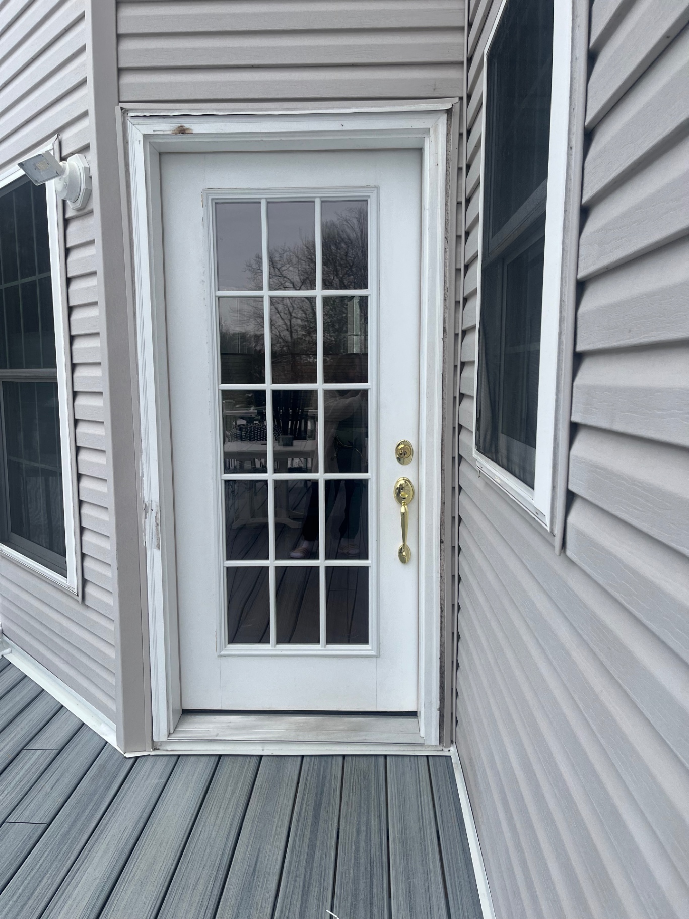 Full-glass exterior door — before